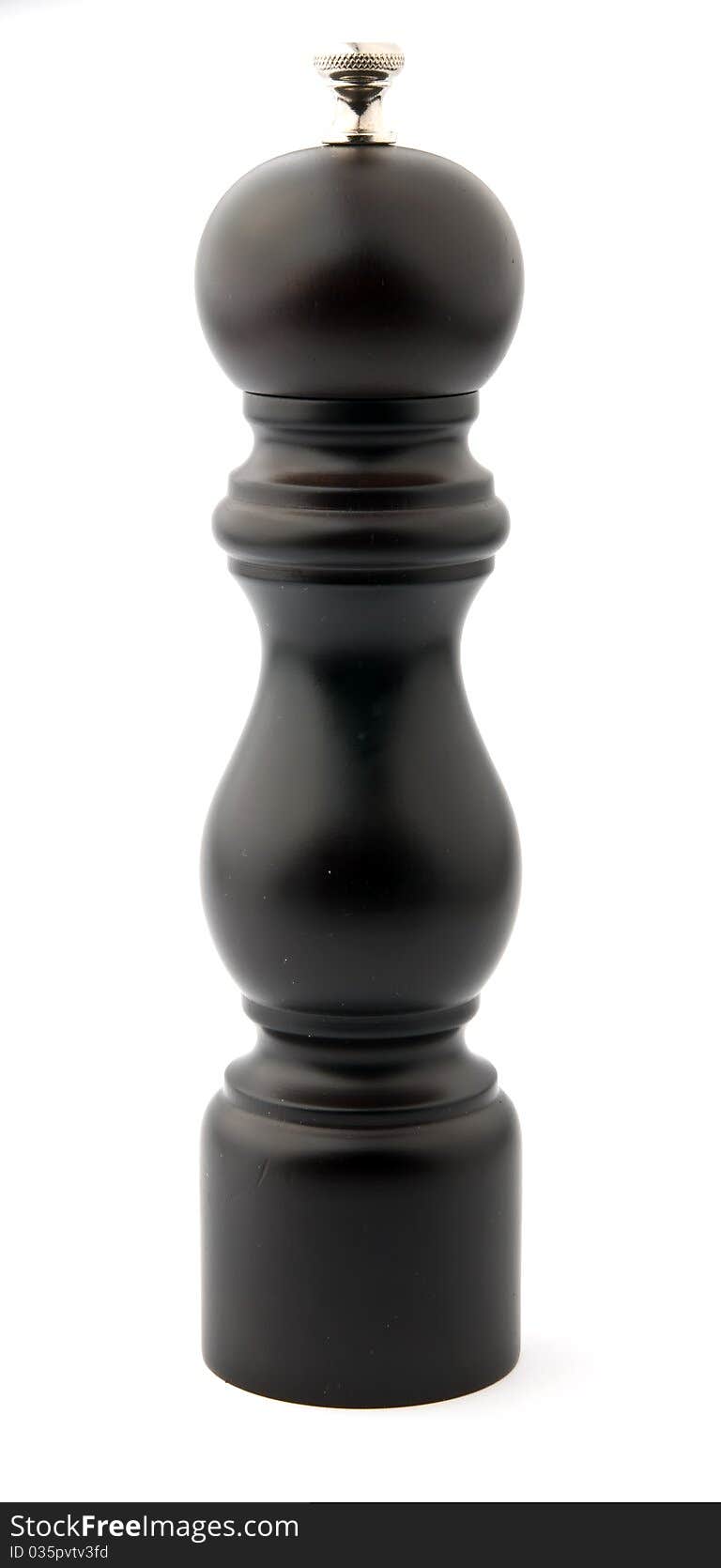 Brown wooden pepper mill isolated over white background