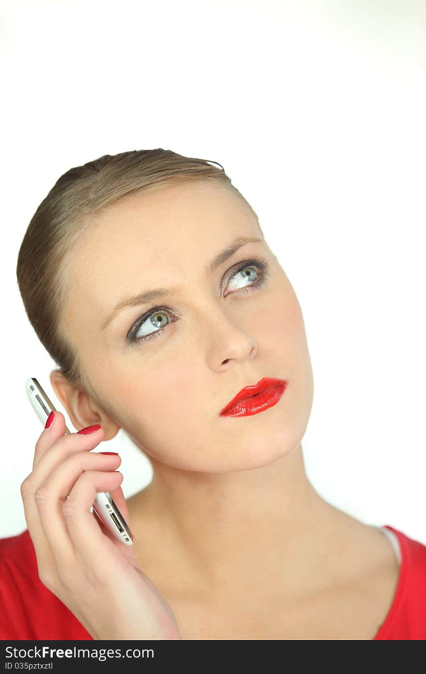 Young woman on phone with red lipstick. Young woman on phone with red lipstick