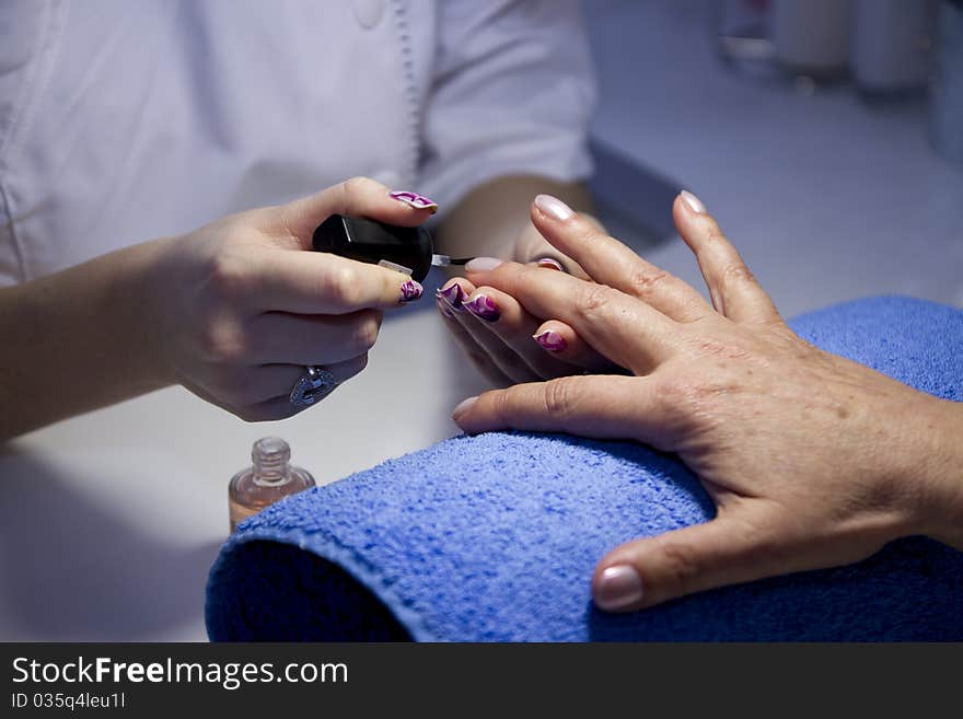 Nail manicure at beauty salon. Nail manicure at beauty salon