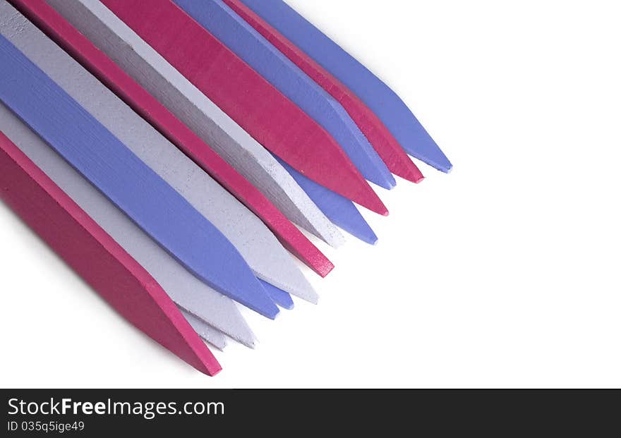 Coloured plant marker pegs on white background. Coloured plant marker pegs on white background