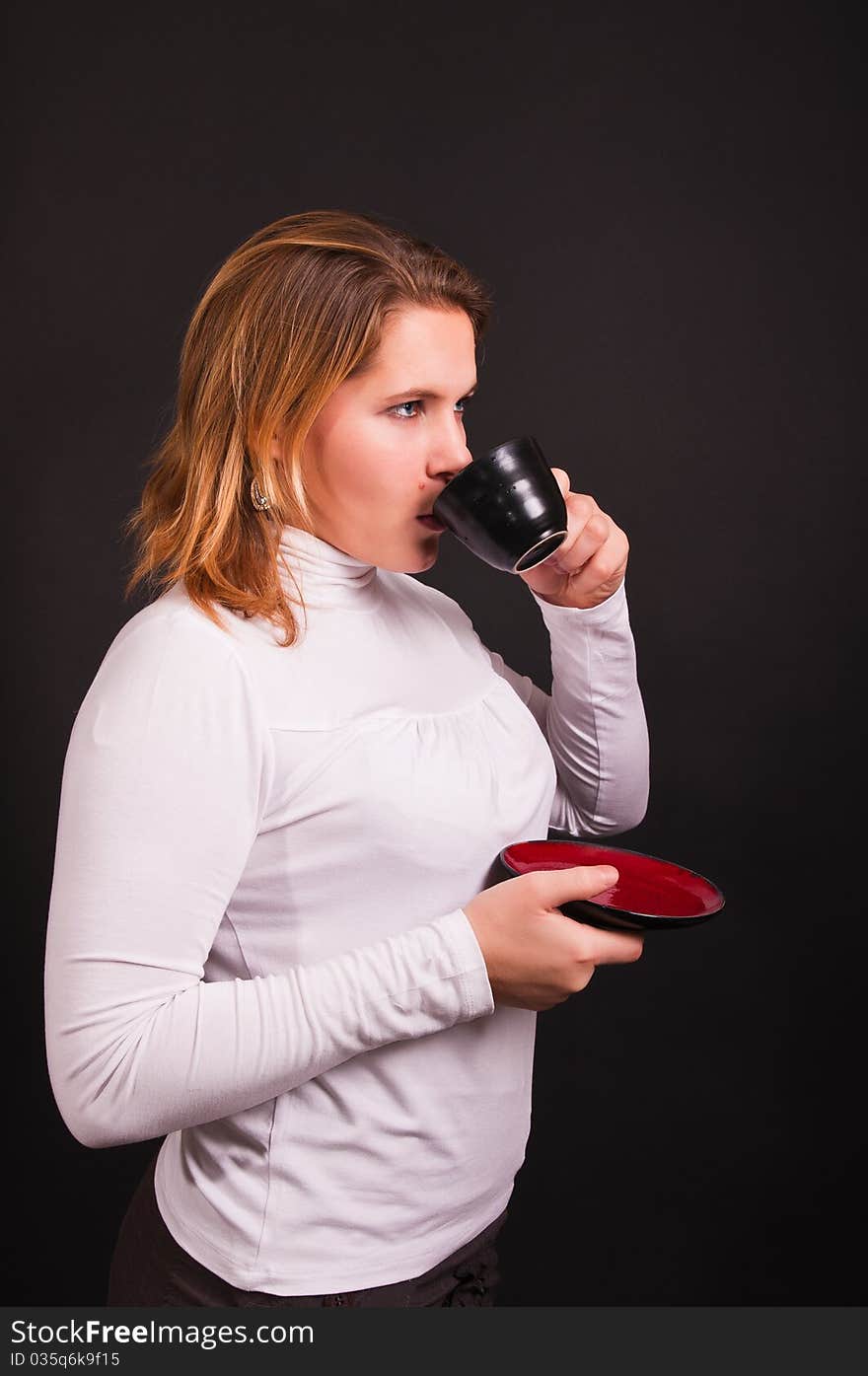 Businesswoman with cup of coffee