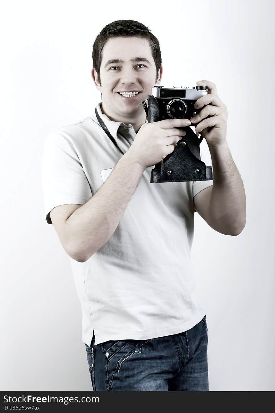 Happiness man with vintage photo camera. Happiness man with vintage photo camera.