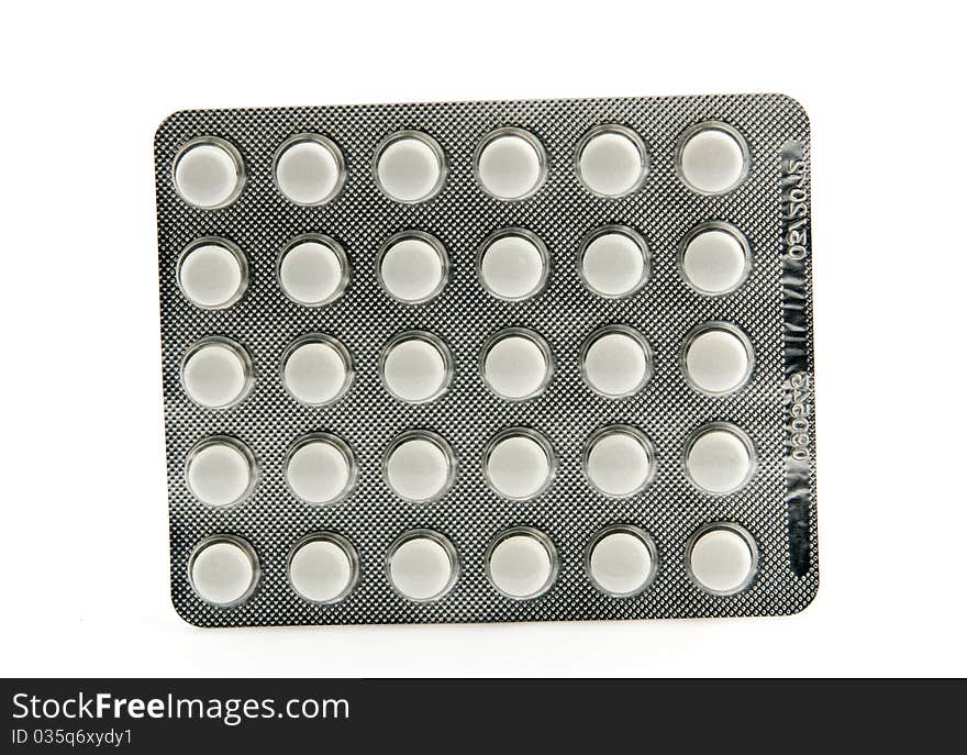 Pills blister isolated over white