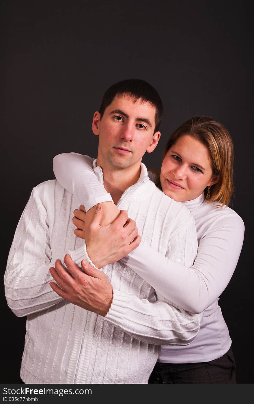 Young couple in love (isolated on black)