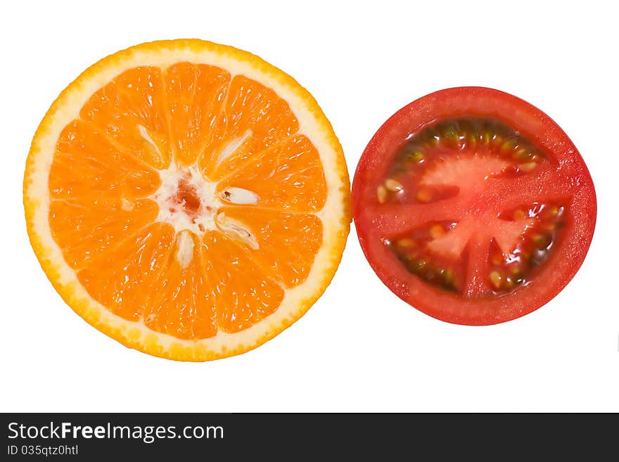 Orange and tomato on white background