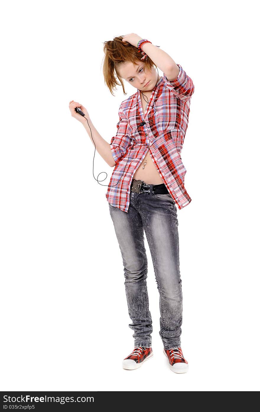 Teenager with mobile phone on a white background. Teenager with mobile phone on a white background