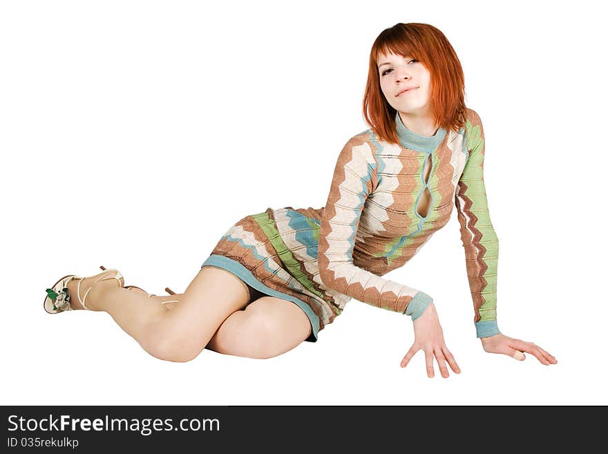 Redhead Woman In Fashion Dress Sitting On Floor