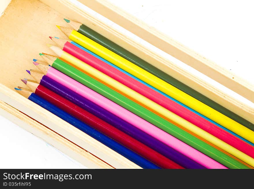 Coloring pencils in a wooden box