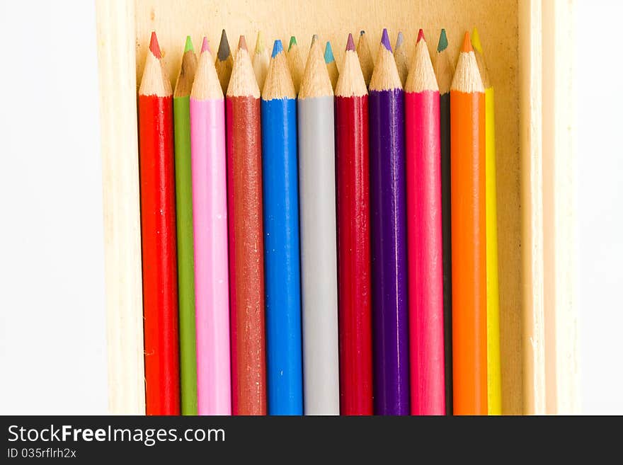 Coloring pencils in a wooden pencil box