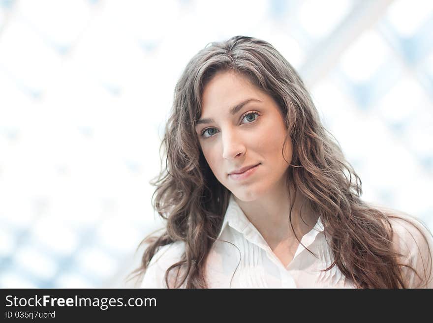 Elegant Young Woman In Library