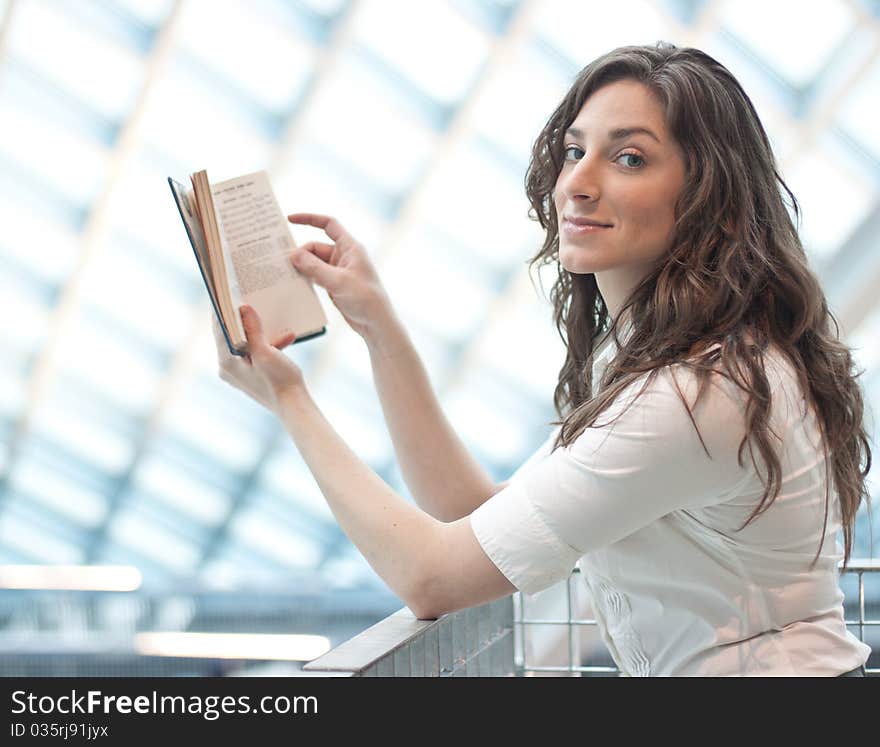 Elegant Young Woman Reading