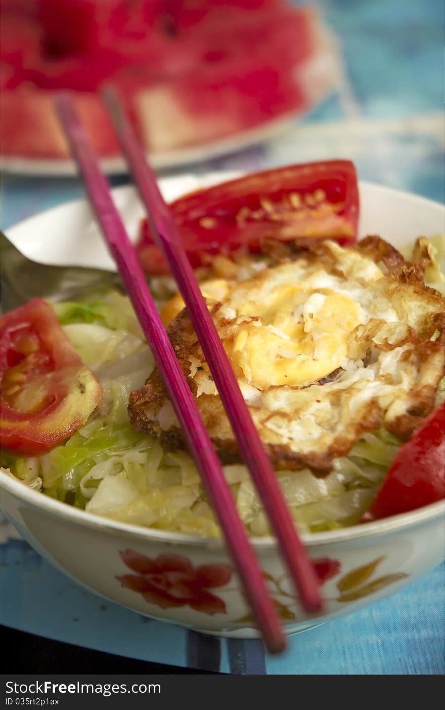 Vegetables with chopsticks