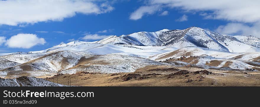 Mountain covered with snow, panoramic view. Mountain covered with snow, panoramic view