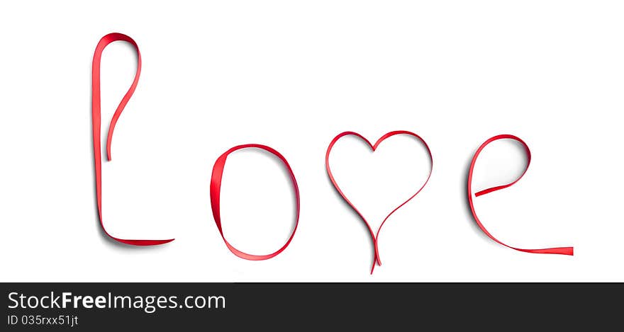 Love word written in red ribbon