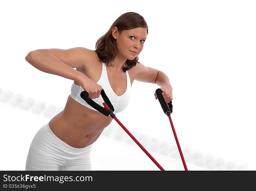 Fit and muscular young caucasian woman exercising with power lines. Fit and muscular young caucasian woman exercising with power lines