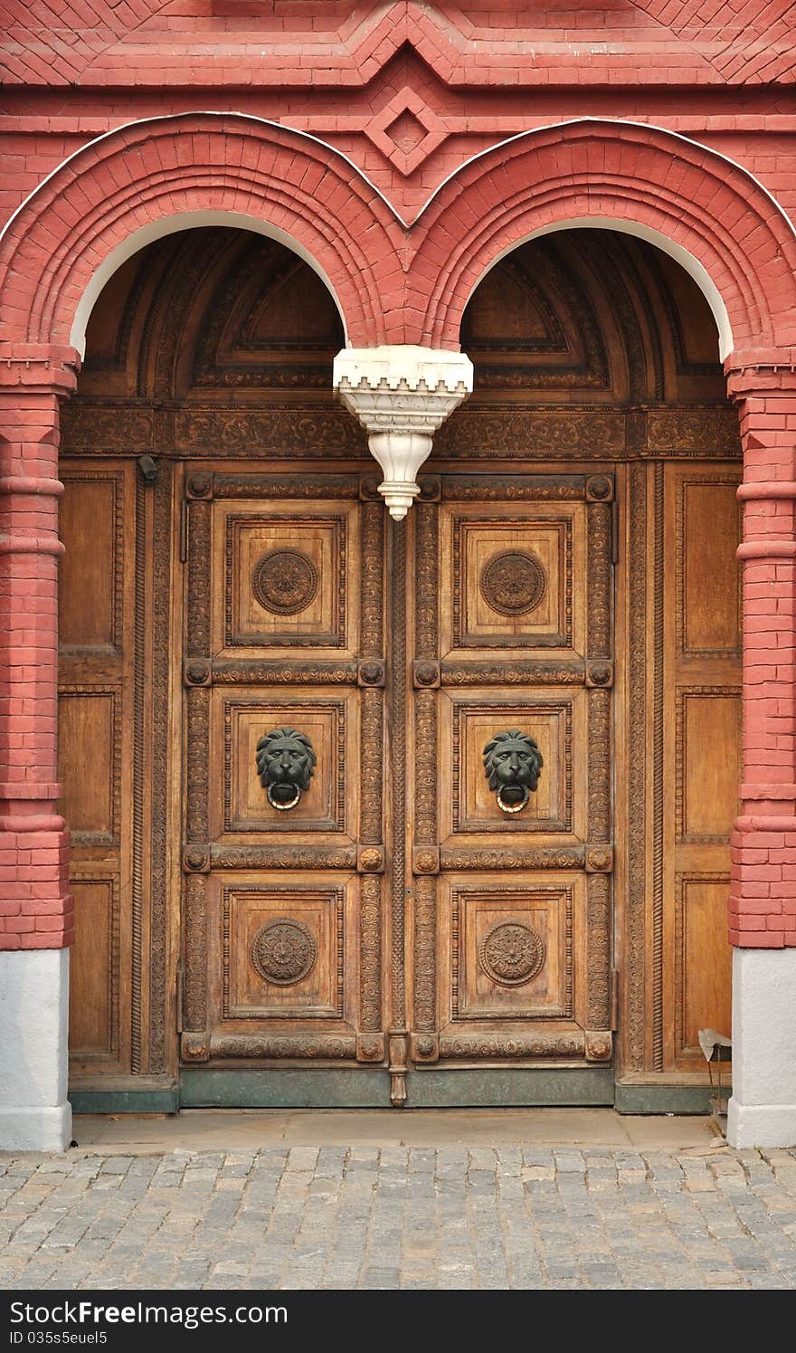 Old wooden door with carved ornament