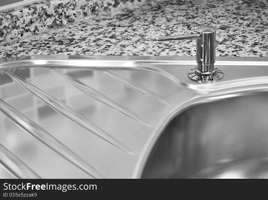 Close-up of a sink in a modern kitchen. Close-up of a sink in a modern kitchen