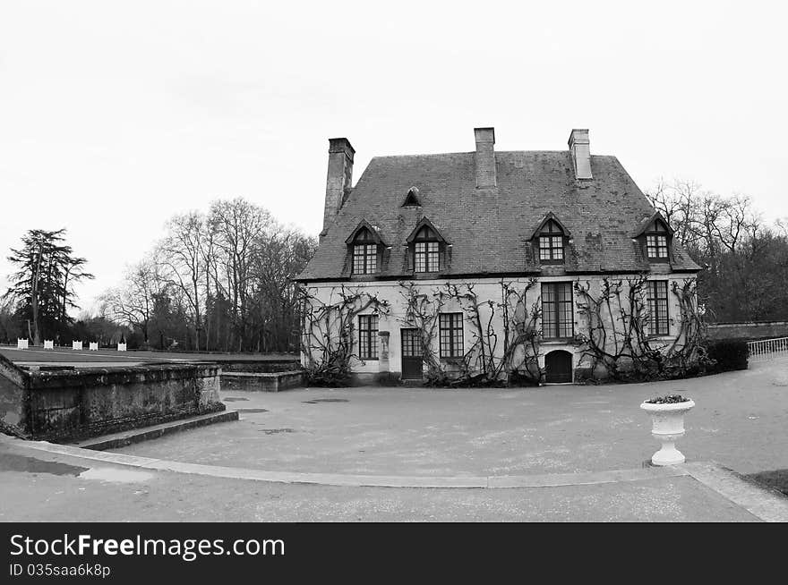 Black and white photo of the Chancellerie house at Chenonceau Castle in the Loire Region of France during winter. Black and white photo of the Chancellerie house at Chenonceau Castle in the Loire Region of France during winter.