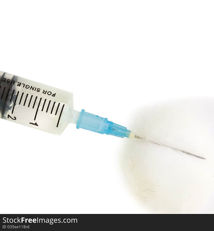 Syringe and Cotton isolated with text space