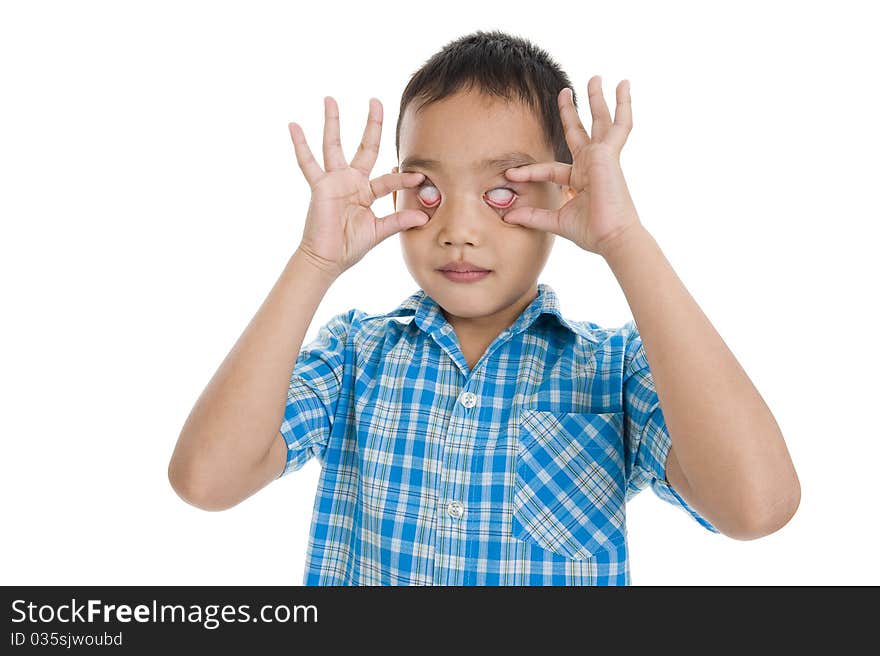 Boy making his pupils disappear, isolated on white background. Boy making his pupils disappear, isolated on white background