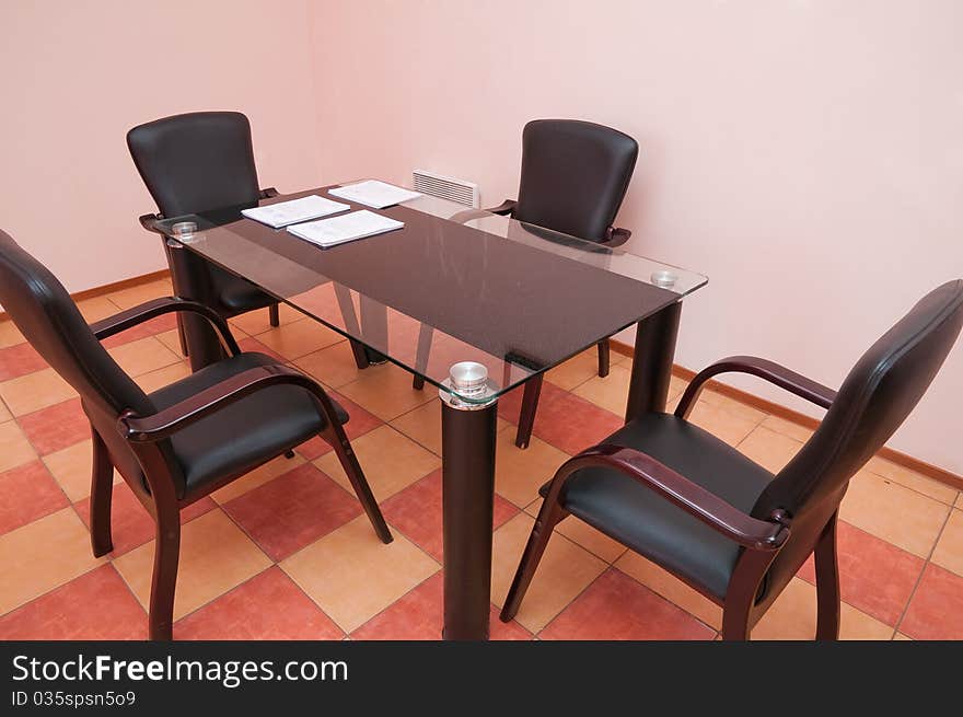 Table and four armchairs at office. Table and four armchairs at office.