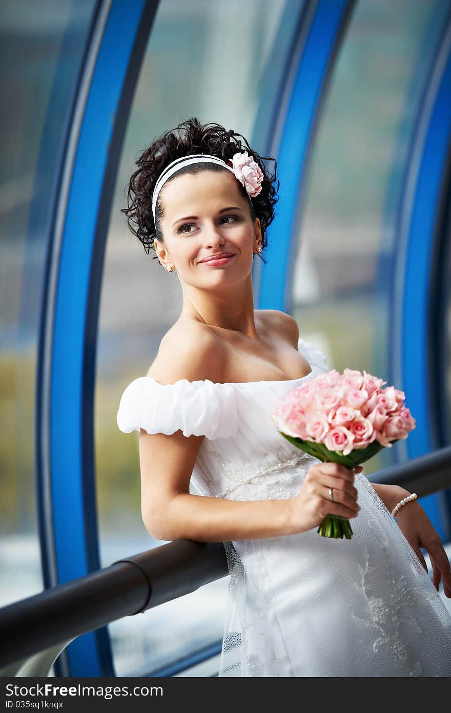 Happy Bride With A Wedding Bouquet