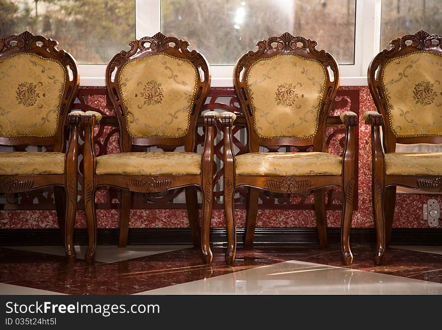 Luxurious Chair isolated on a interior background.