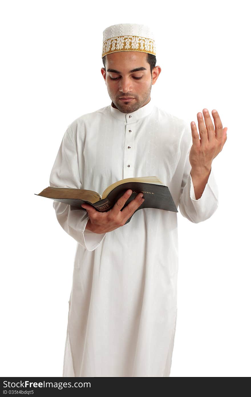 Teacher or preacher reading from a religious book, or other literary book.  White background. Teacher or preacher reading from a religious book, or other literary book.  White background.