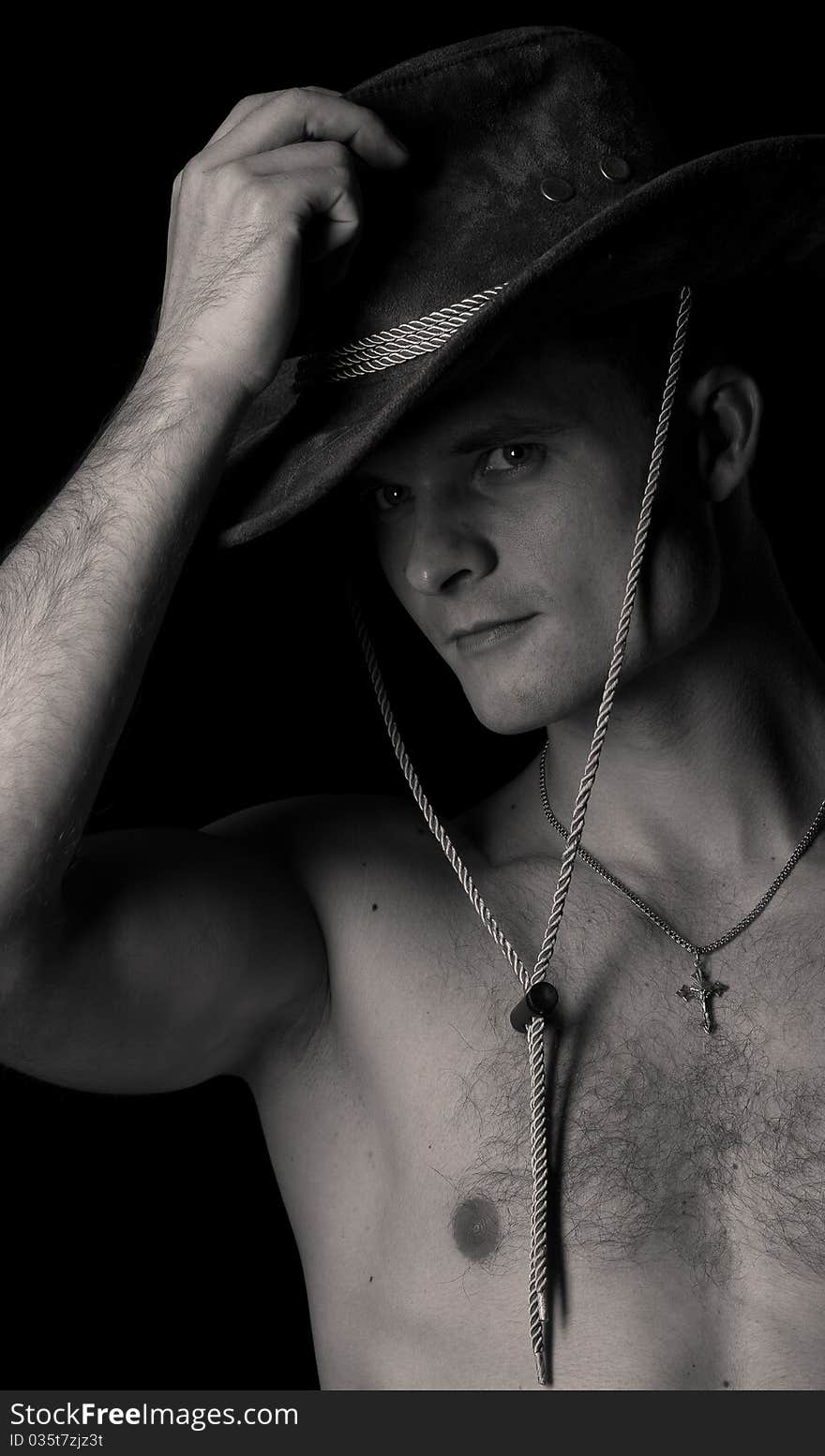 Oung Shirtless Male Person Holding A Cowboy Hat