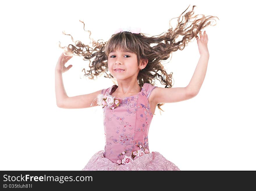 Beautiful little girl dancing and hands up