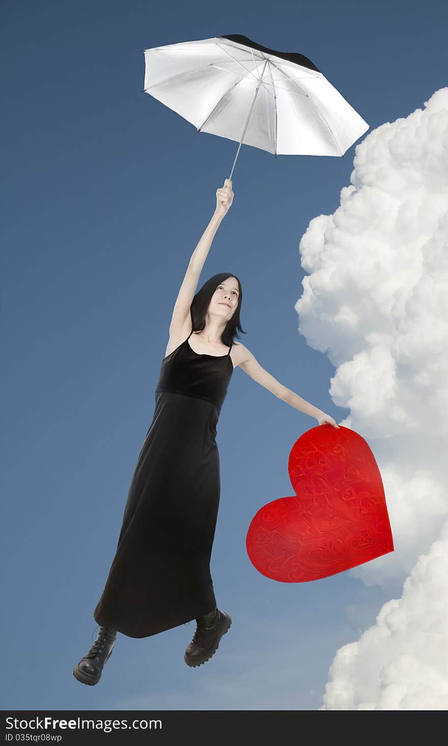 Young lady and gift on white background