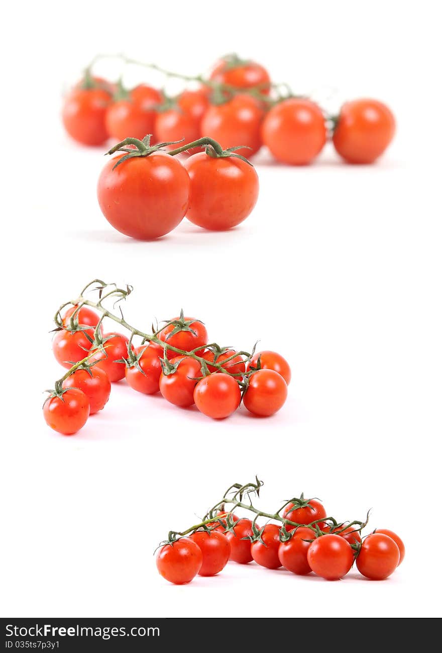 Mini tomatoes on white background