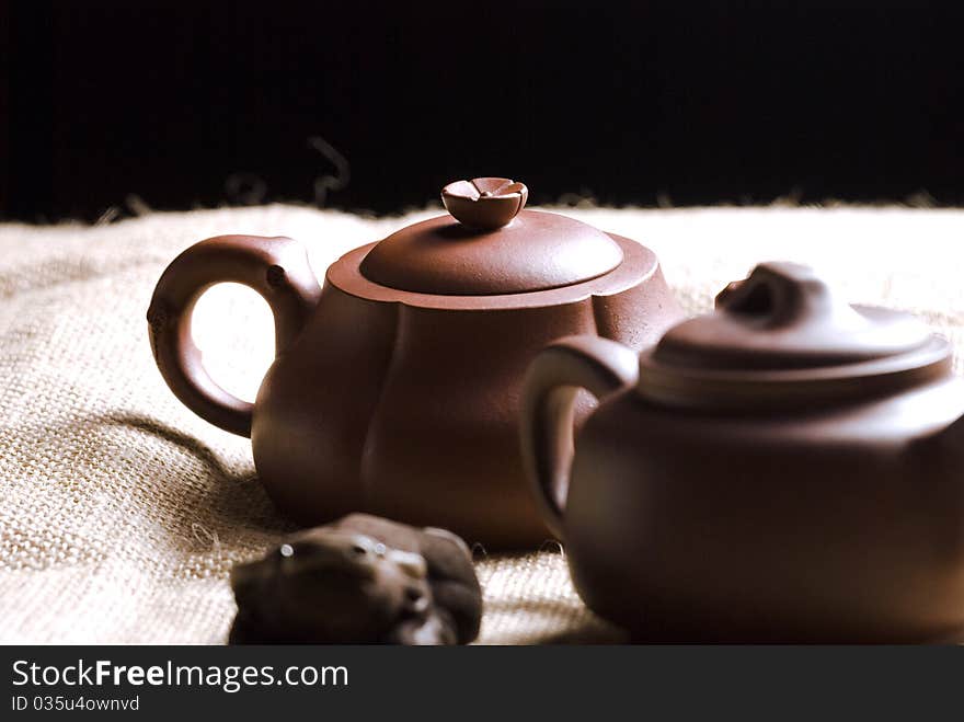 Chinese teapots with canvas background.