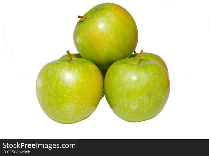 Green apples heap on white background, isolated