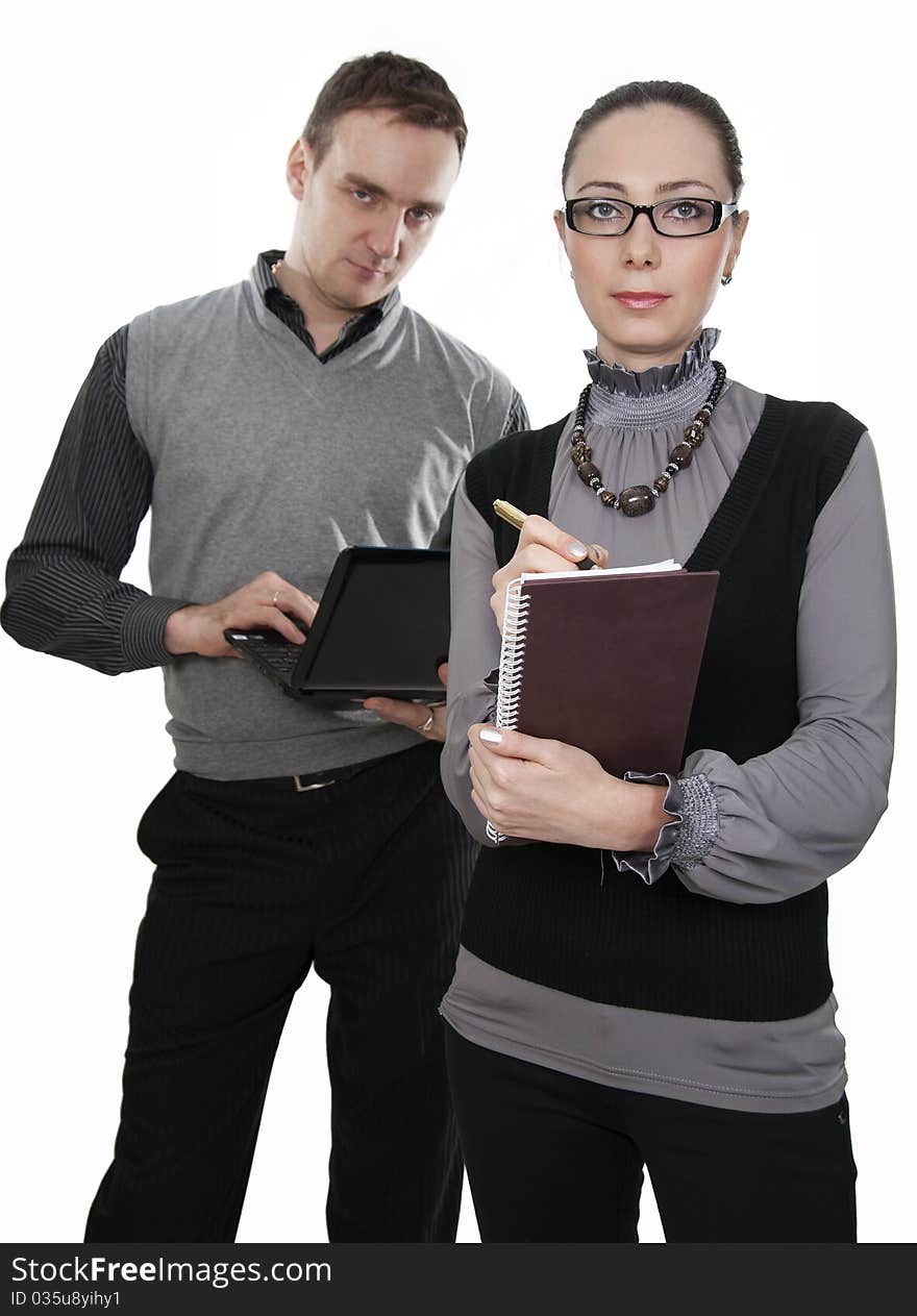 Businessman with the computer and businesswoman at a meeting. Businessman with the computer and businesswoman at a meeting.