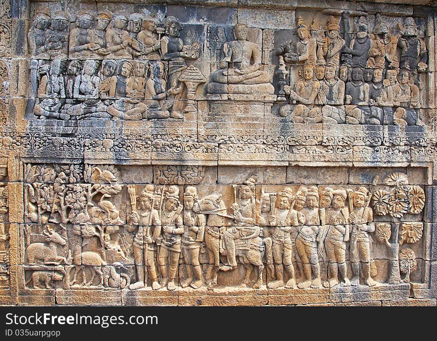 Stone carving in the Borobudur temple near Yogyakarta on Java island, Indonesia. Stone carving in the Borobudur temple near Yogyakarta on Java island, Indonesia