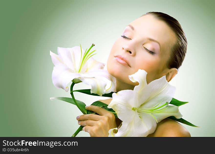 Portrait of Fresh and Beautiful woman with flower