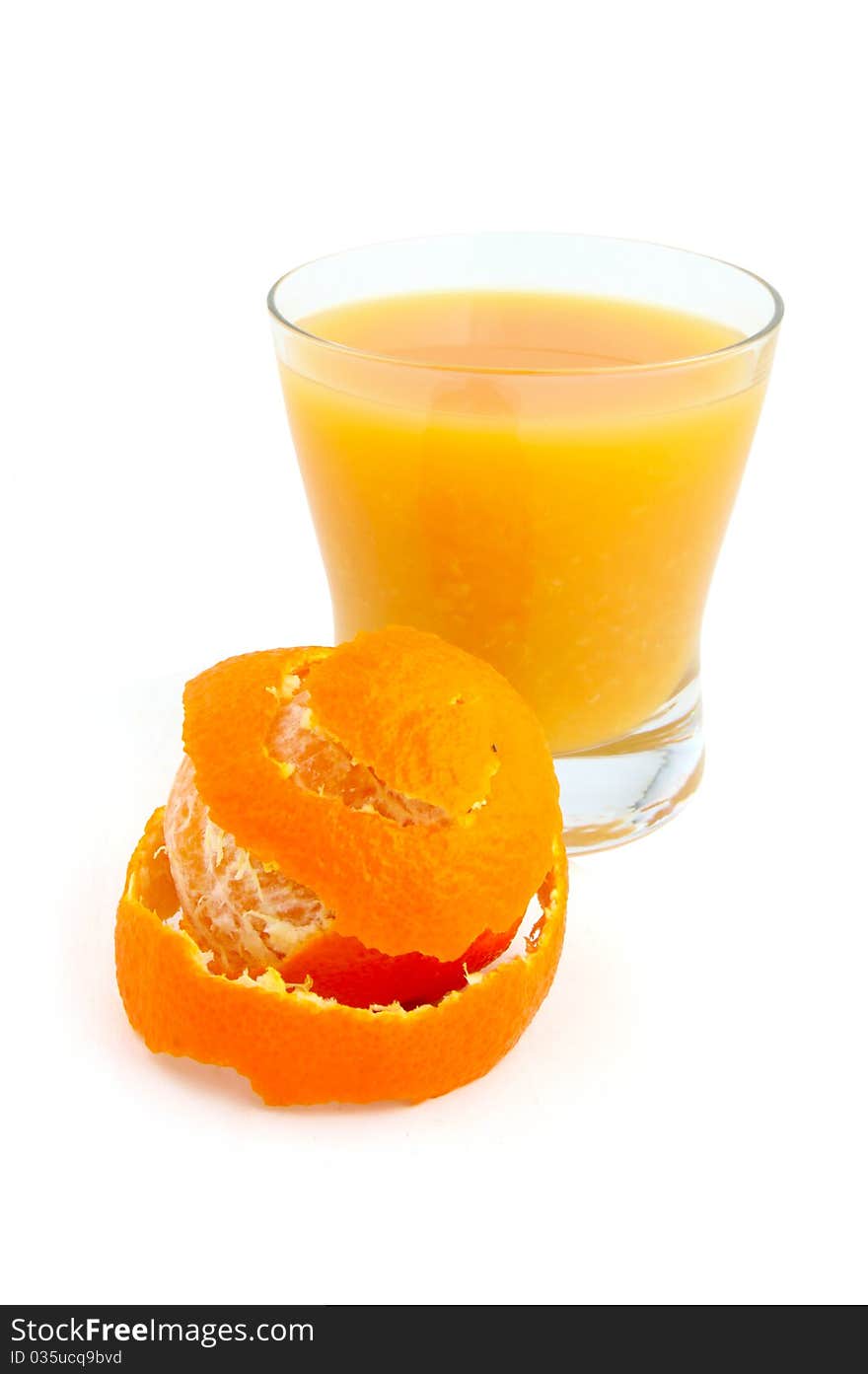 Juice of a tangerine on a white background. Juice of a tangerine on a white background