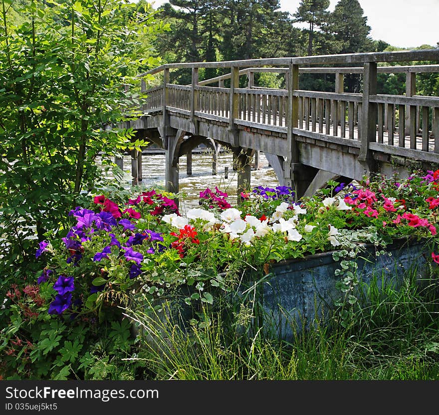 Flower trough by a Wooden Footbridge