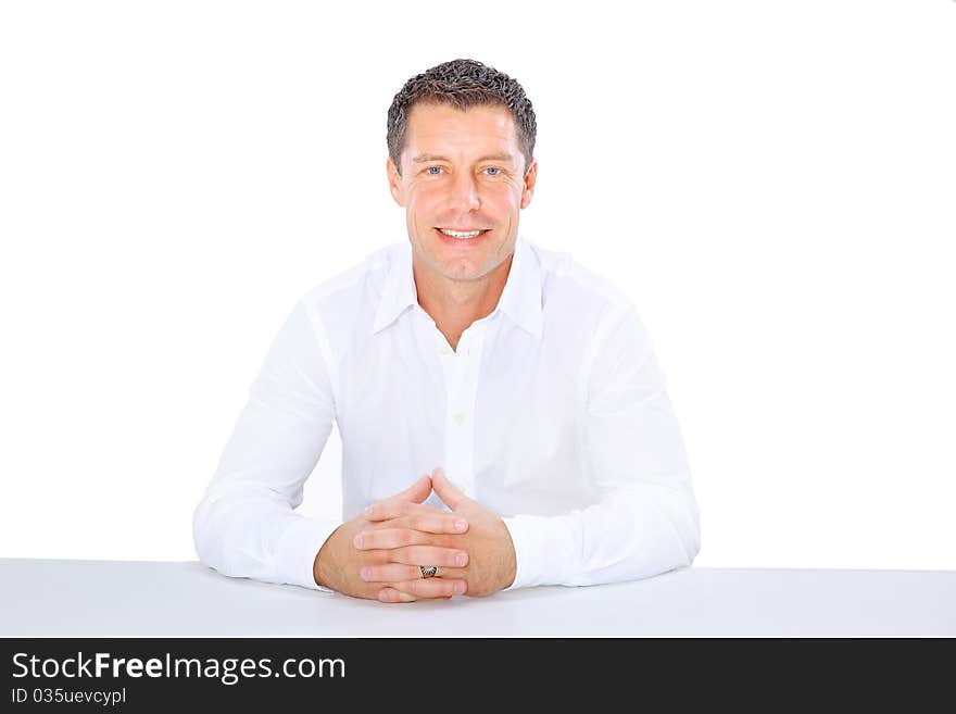 Closeup portrait of a senior man smiling on white background