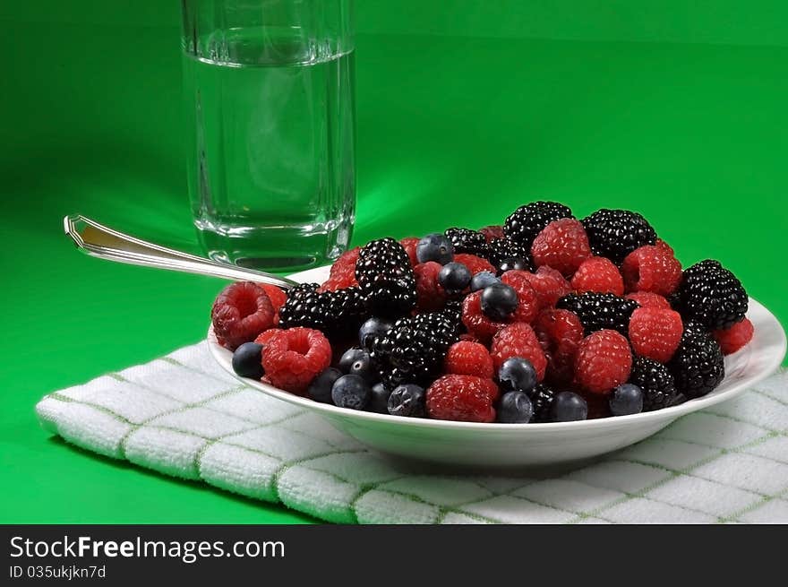 Raspberries Blackberries and Blueberries in a Plate. Raspberries Blackberries and Blueberries in a Plate