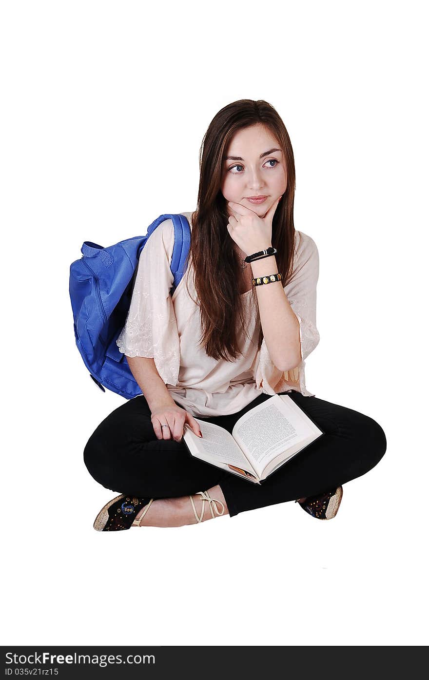 An teenager sitting on the floor with a blue backpack over her shoulder
in a blouse and black tights, with a book on her lap, for white background. An teenager sitting on the floor with a blue backpack over her shoulder
in a blouse and black tights, with a book on her lap, for white background.