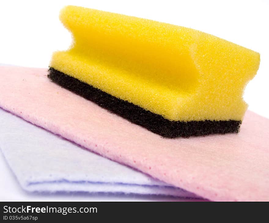 Cleaning sponge and wiping cloth isolated on white background. Cleaning sponge and wiping cloth isolated on white background