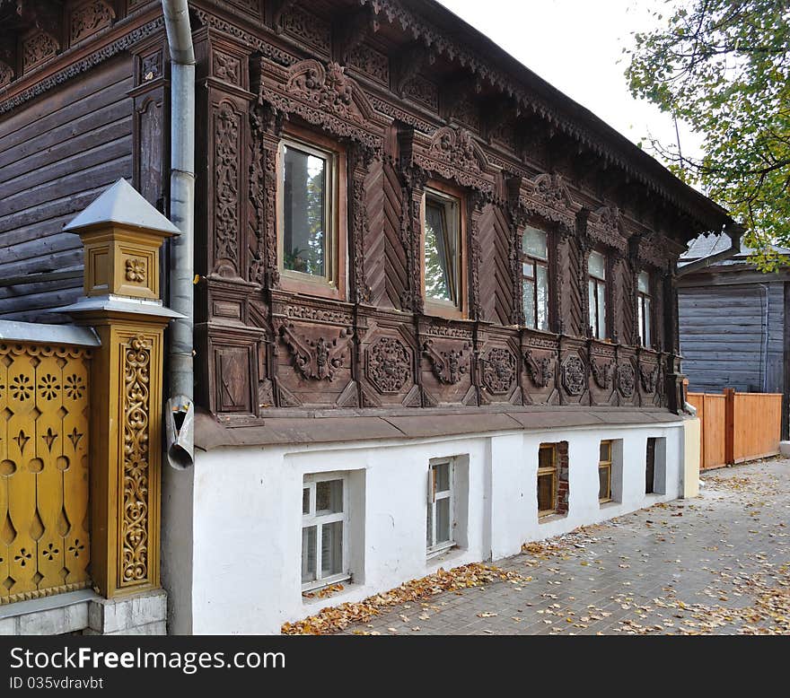 Beautiful wooden house with carved front