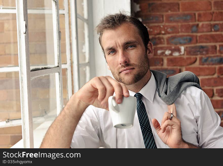 Window portrait of business man