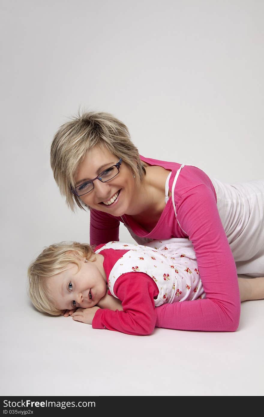 Portrait of cute girl with her mother having fun. Portrait of cute girl with her mother having fun