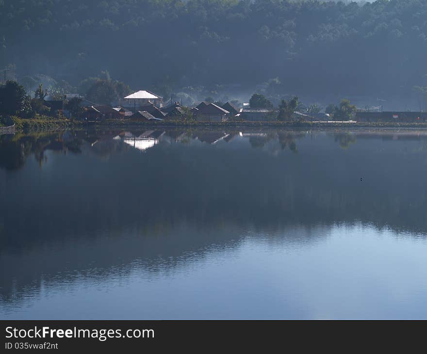 Beautiful a hut refection on lake, North of Thailand.