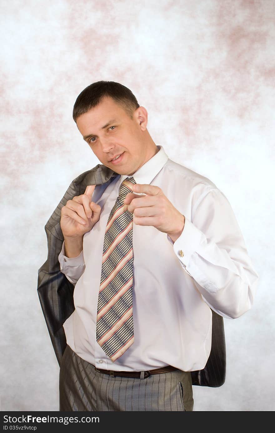 Portrait of the businessman on an abstract background. Portrait of the businessman on an abstract background