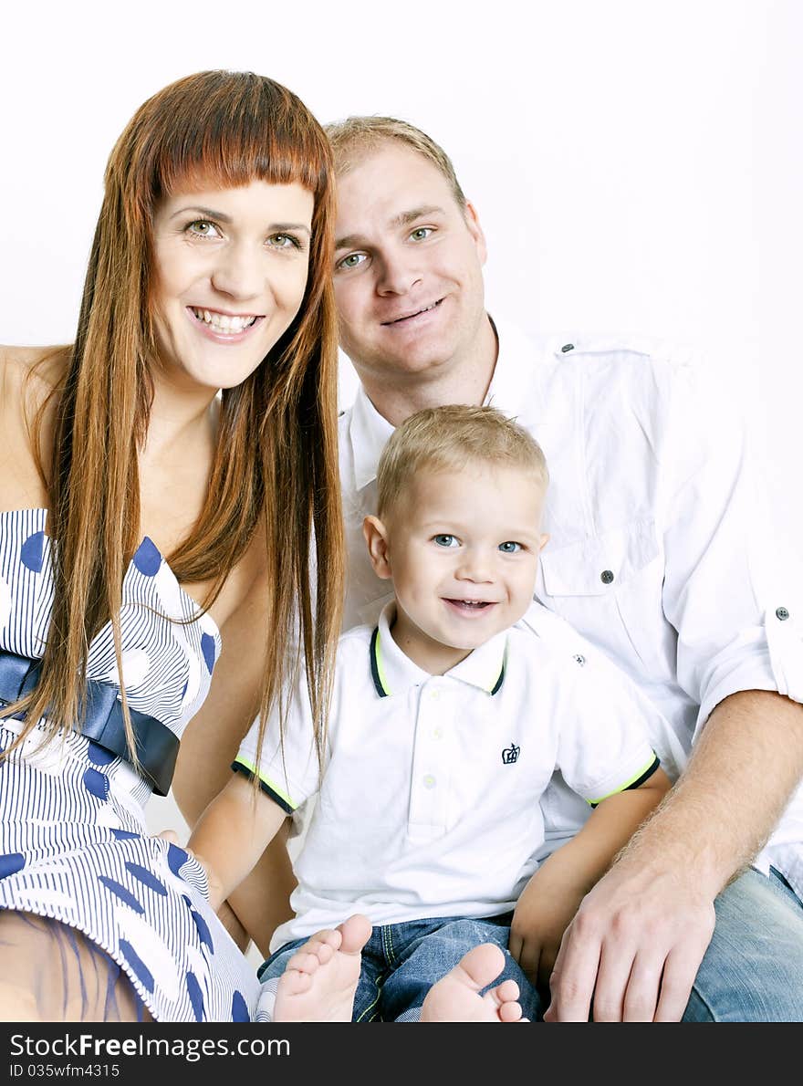 Portrait of parents with their little son. Portrait of parents with their little son