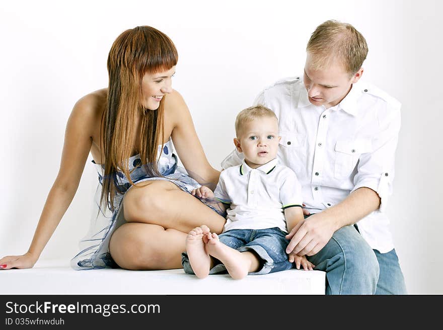 Portrait of parents with their little son. Portrait of parents with their little son